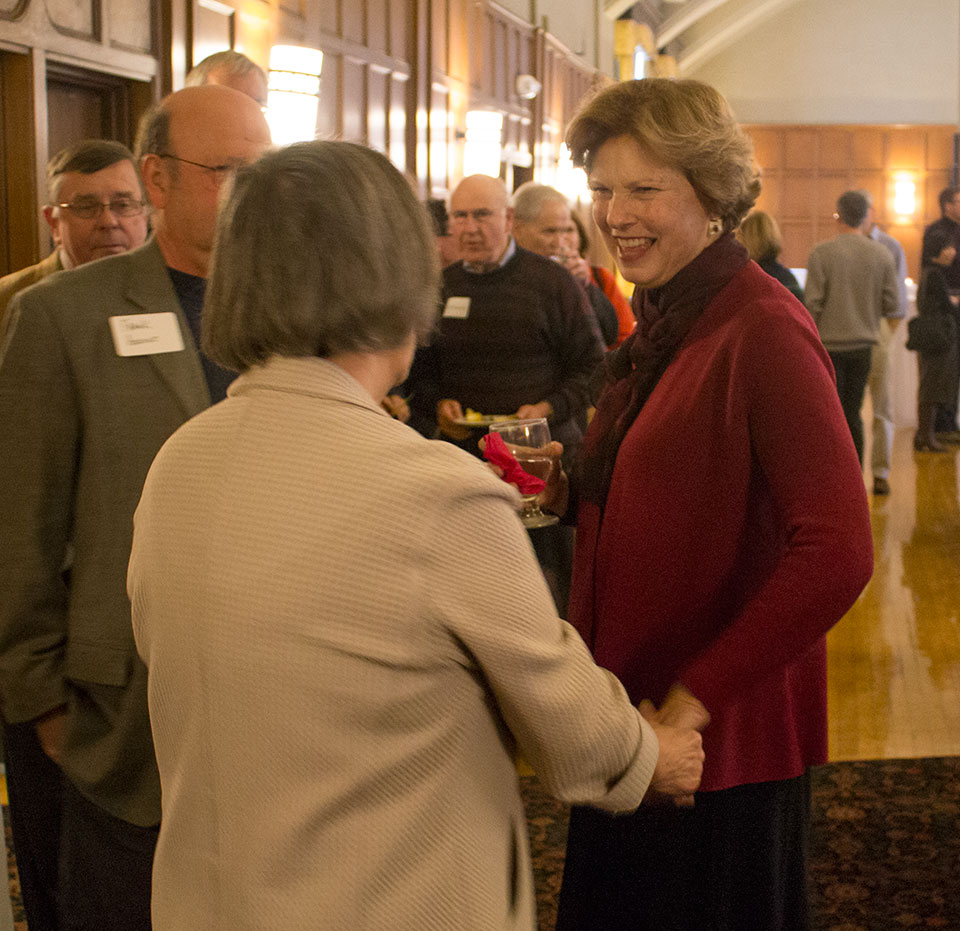 Dr. Cook talking with guests