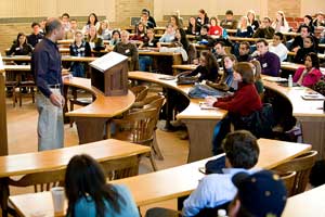students listening to lecture in an auditorium