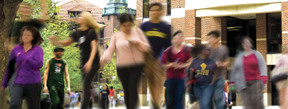 Blurred photo of student walking campus