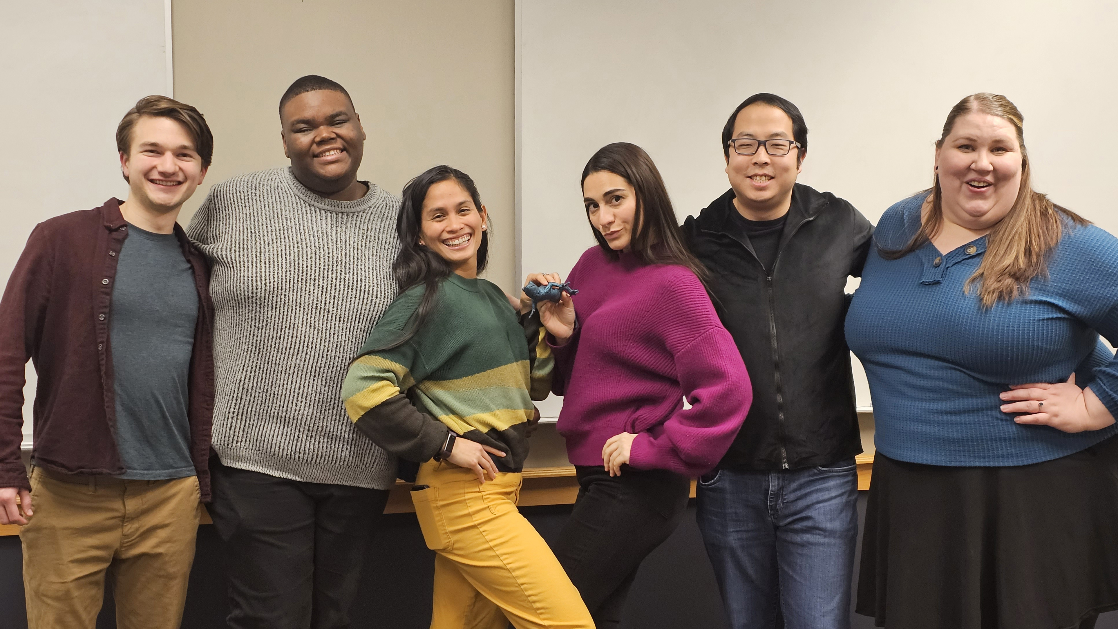 6 performers pose for the camera