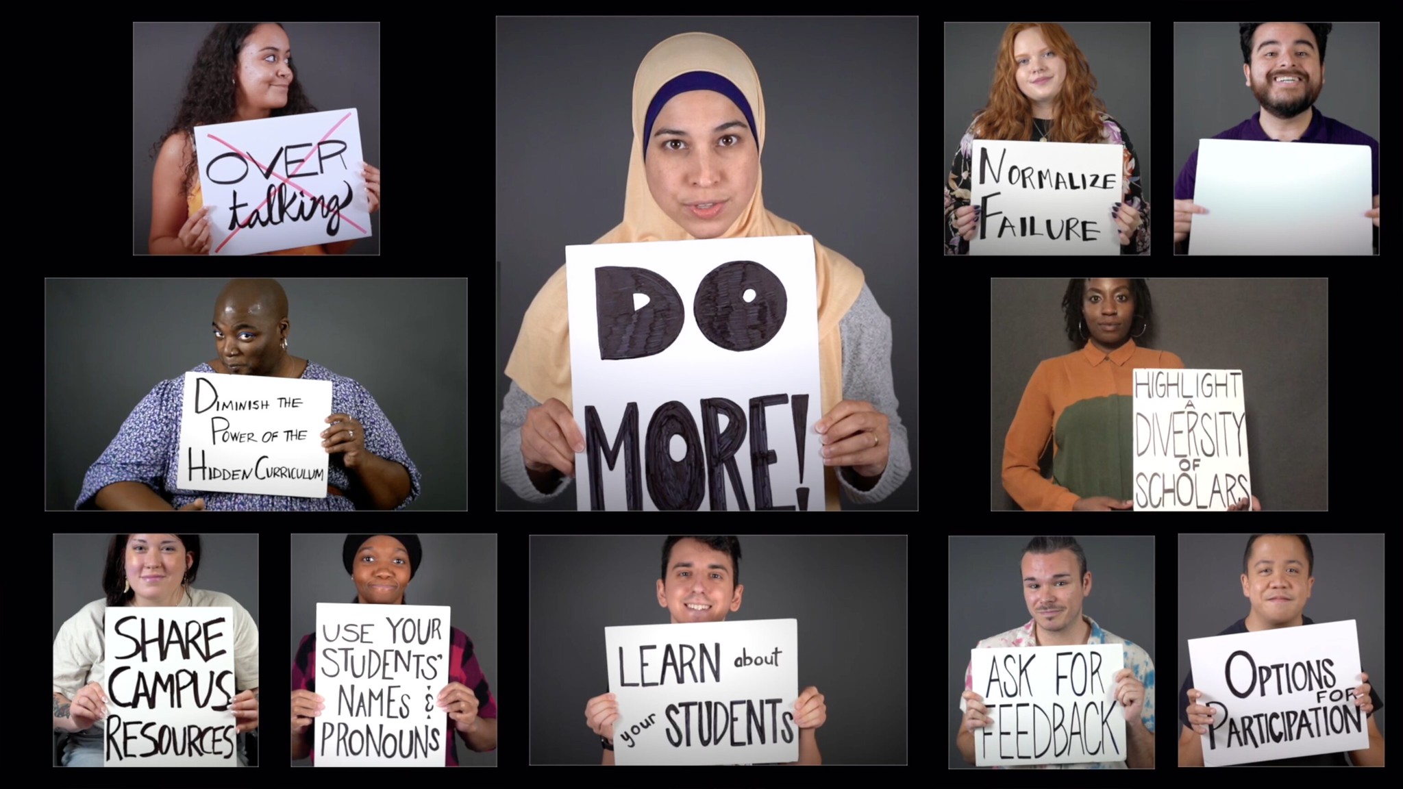 Screenshot of Players performance where 11 actors are holding signs with writing